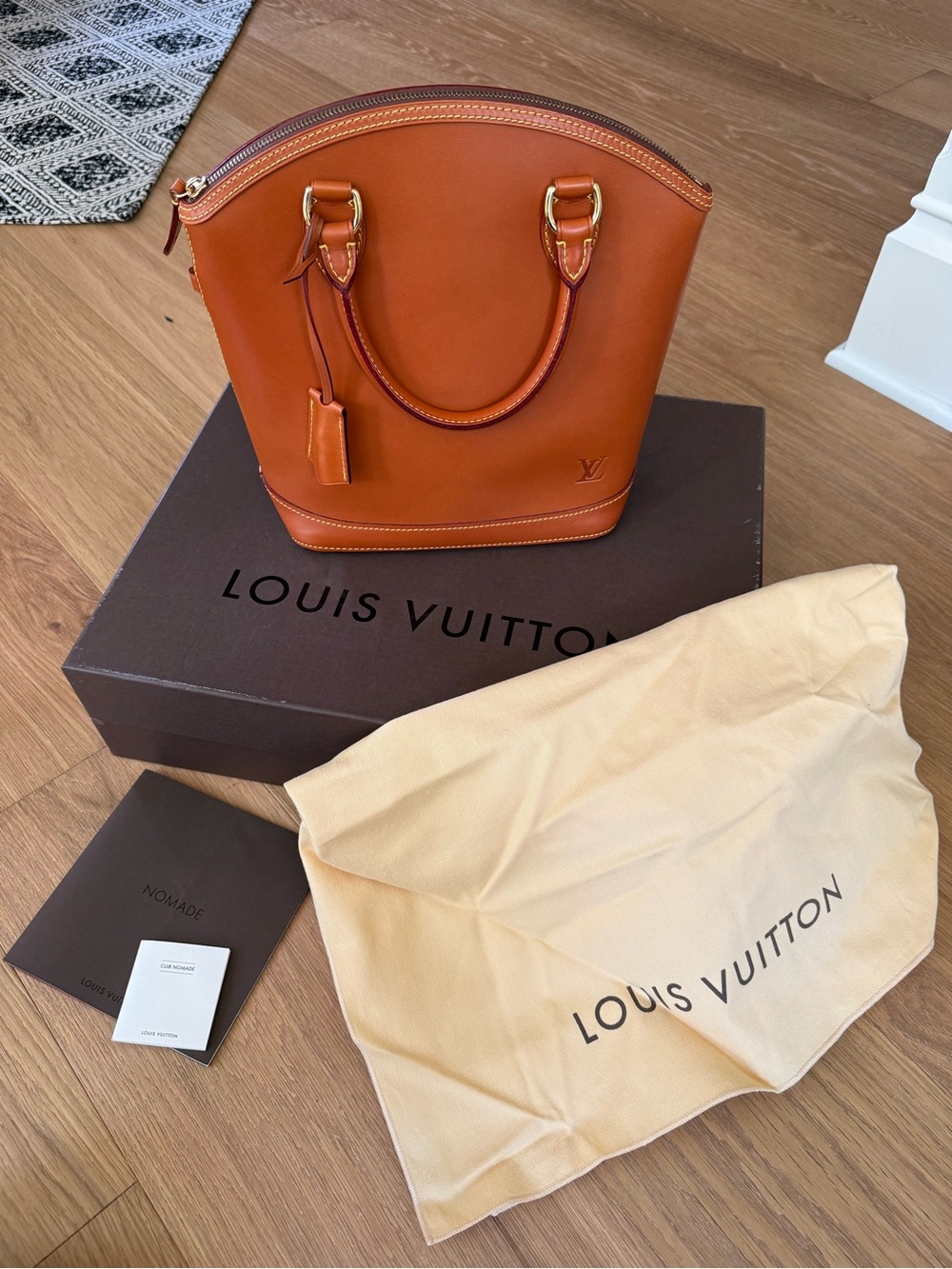 Louis Vuitton Nomad Leather Lockit Handbag - Picture 10 of 12